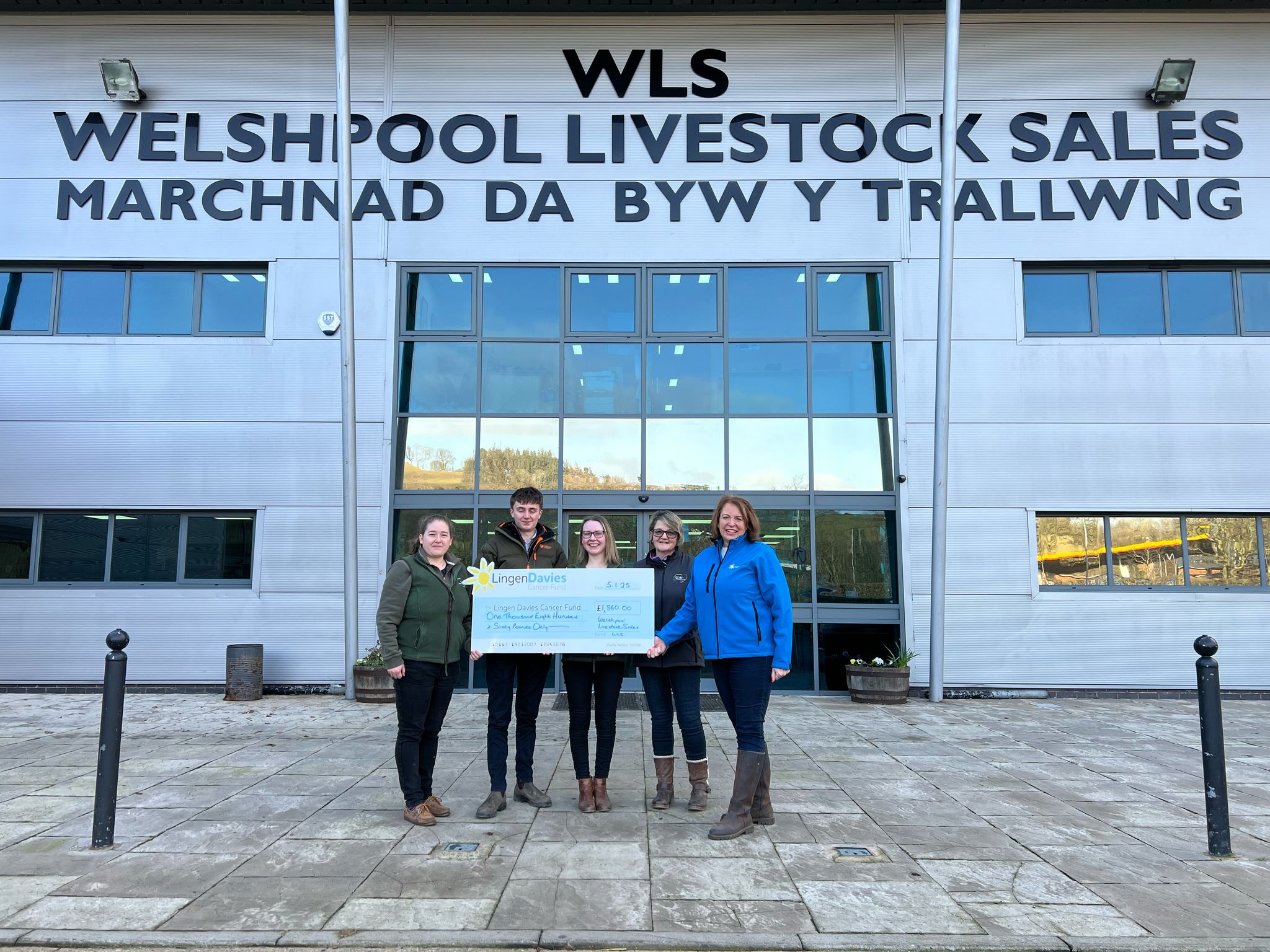 Pictured are staff from Welshpool Livestock Market with Angela Hill from Lingen Davies.